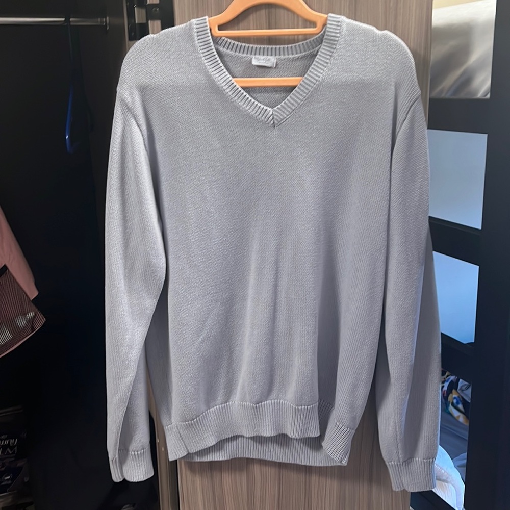 Never worn light blue sweater